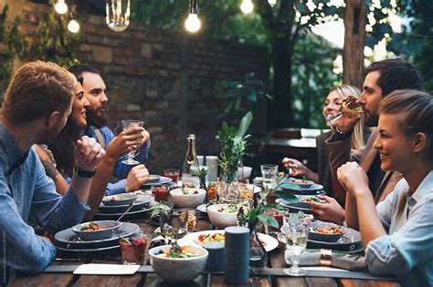 Dinners to make with friends. Friends at Dinner Party at Backyard by Lumina - Dinner ...