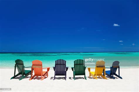 Colorful Chairs At A Tropical Beach In The Caribbean High Res Stock