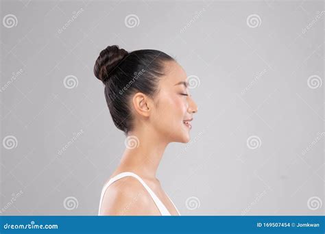 Side View Of Beautiful Asian Woman Close Eyes Smile With Clean And