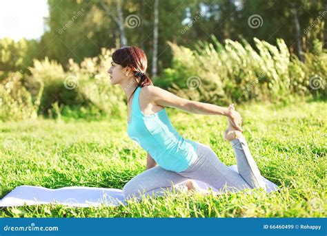 Woman Doing Yoga Exercises On Grass In Summer Day Stock Image Image Of Exercise Recreation