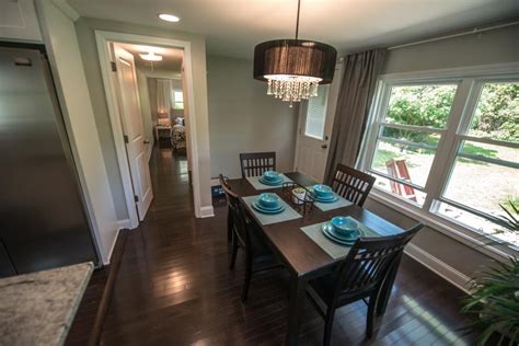 Contemporary Brown Dining Room With Brown Chandelier Hgtv