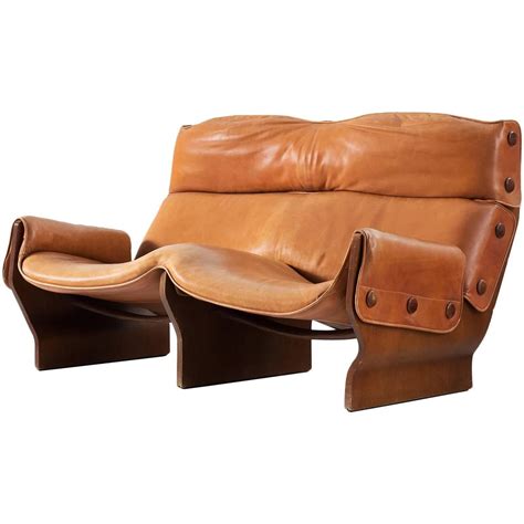 Osvaldo Borsani Teak And Cognac Leather Sofa For Tecno Italy Recliner