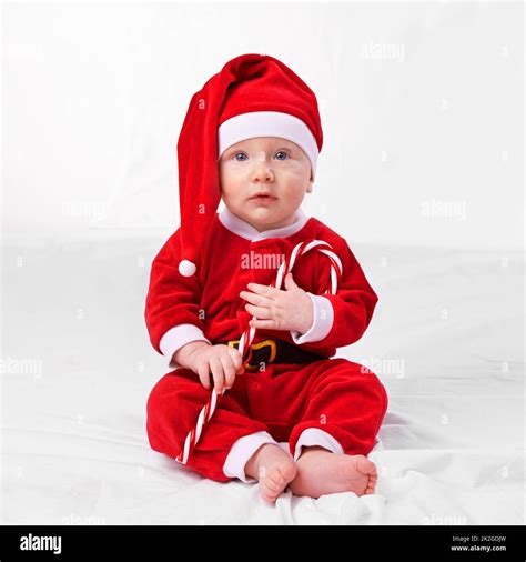 The biggest gift of all. Studio shot of a little boy dressed up in a