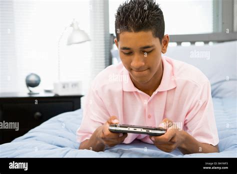 Teenage Boy Video Game Bed Hi Res Stock Photography And Images Alamy