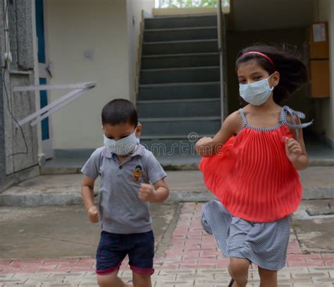 Kids Playing Outdoor With Mask Stock Image Image Of Influenza