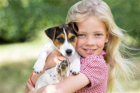 Portrait Of Girl Holding Pet Dog Stock Photo Image Of Holding