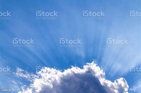 Sun Rays Through The White Clouds Background Blue Sky With Clouds Stock