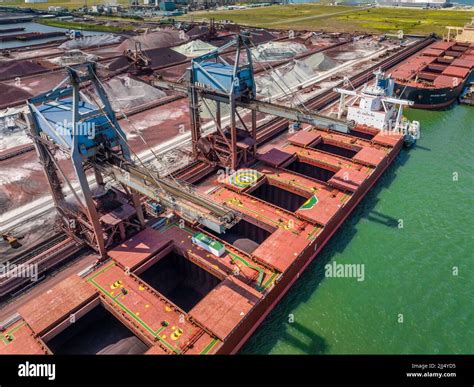 Bulk Carrier Ship Unloading Cargo By Crane At Port Stock Photo Alamy