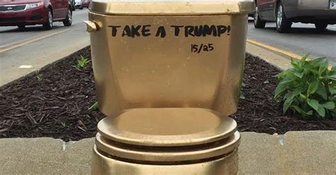 Heres What Those Golden Take A Trump Toilets Mean