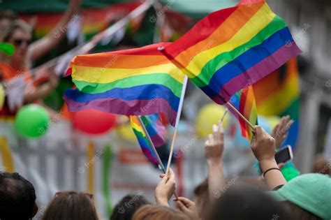 Premium Photo People Wave Lgbtq Gay Pride Flags At A Solidarity March