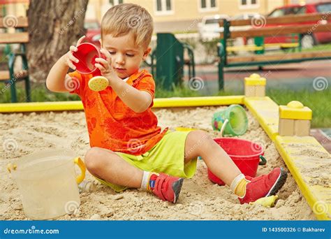 Little Boy On Playground Playing Child In Sandbox Stock Photo Image