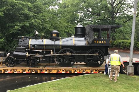 the civil war picket cheers applause greet restored civil war locomotive texas at its new