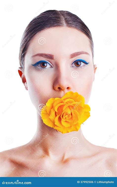 Beautiful Woman With Yellow Rose Flower In Her Mouth Stock Photo