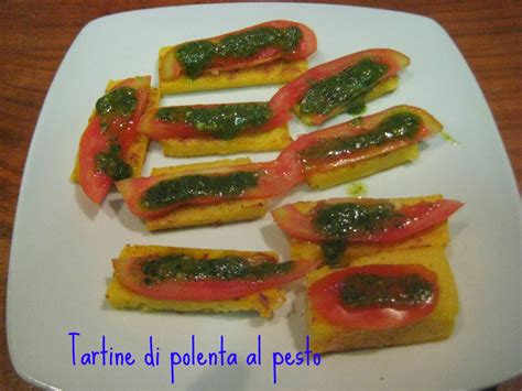 Polenta a fette al forno dai migliori blog di ricette di cucina italiani. Donatella in cucina - blog di cucina: Tartine di polenta ...
