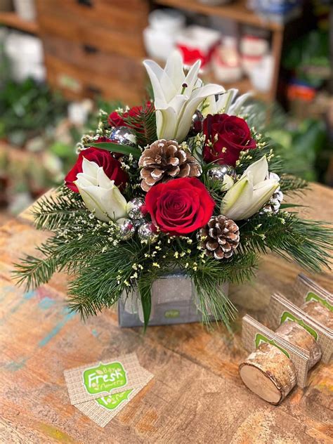 Christmas Flower Arrangement With Lilies And Roses Buy In Vancouver