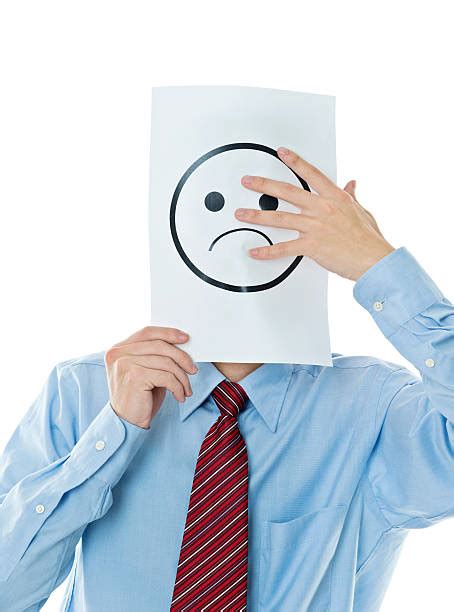 Businessman Holding Paper With Sad Face Stock Photos Pictures