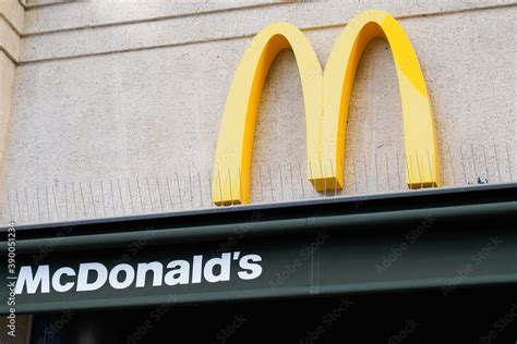 M Yellow Mcdonald Logo And Sign On Building Wall Of Mcdonalds