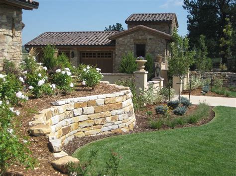 Let me show you what plants work well for landscaping a rock wall. Retaining Wall Design - Landscaping Network