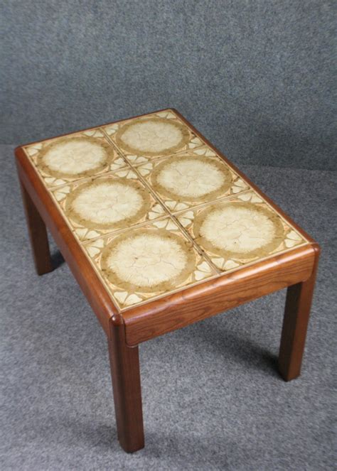 Materials include wood, metal, glass, and more. A 1960s G-Plan teak tile topped coffee table - Elephant ...