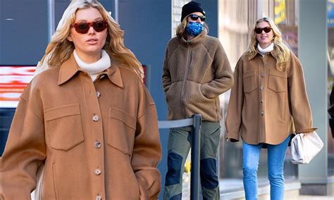 Elsa Hosk Hides Baby Bump In Flowing Jacket As She Steps Out In