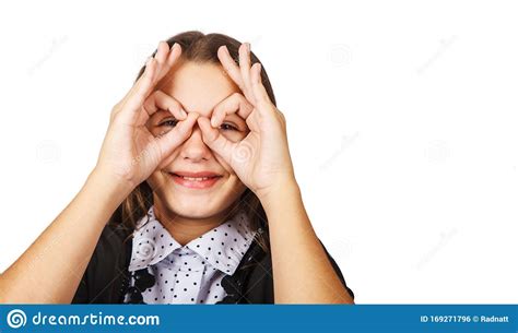 Teen Smiling Brunette Teen Girl Showing Glasses With Her Fingers Stock