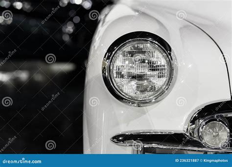 Classic Antique Car Headlight with Copy Space and Dark Background