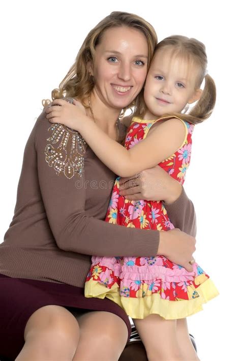 Mother And Little Daughter Gently Embrace Stock Photo Image Of