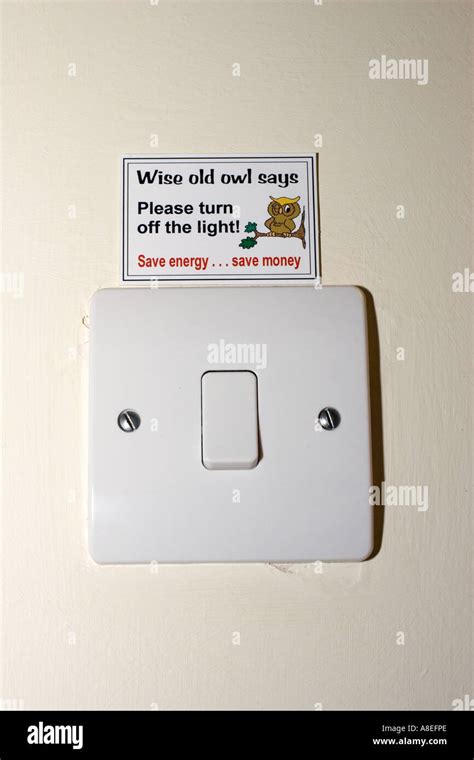 Energy Saving Sticker Above Electric Light Switch Uk Stock Photo Alamy