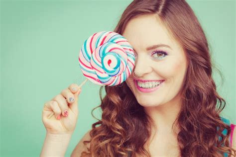 Smiling Girl With Lollipop Candy On Teal Stock Image Image Of Cute