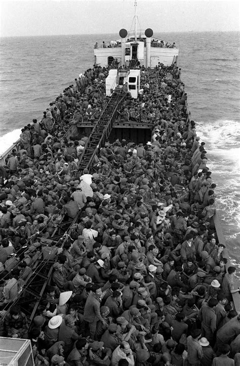South Vietnamese Troops Fill Every Available Space On A Ship Evacuating