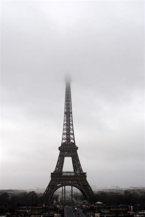 Eiffel Tower Going Into The Fog And Mist Image Free Stock Photo