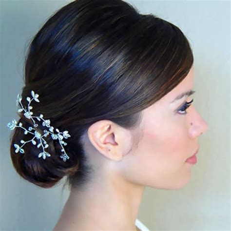 Imagine the geisha style without the stick part of it. 30 Elegant Bridal Updo Hairstyles - Indian Beauty Tips