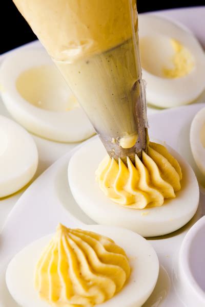 Heat on high until water begins to boil, then cover, turn the heat to low,. Creamy Deviled Eggs - A Food Centric Life