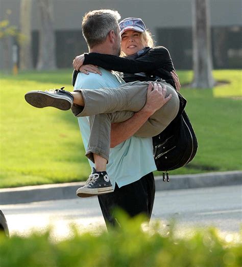 Ant Anstead And Renée Zellweger Spotted Kissing As He Lifts Her Up
