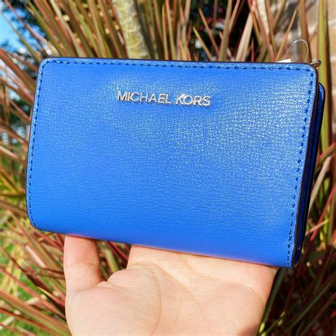 Designer handbags, watches, shoes, clothing & more. Michael kors jet set travel leather bifold zip coin wallet ...
