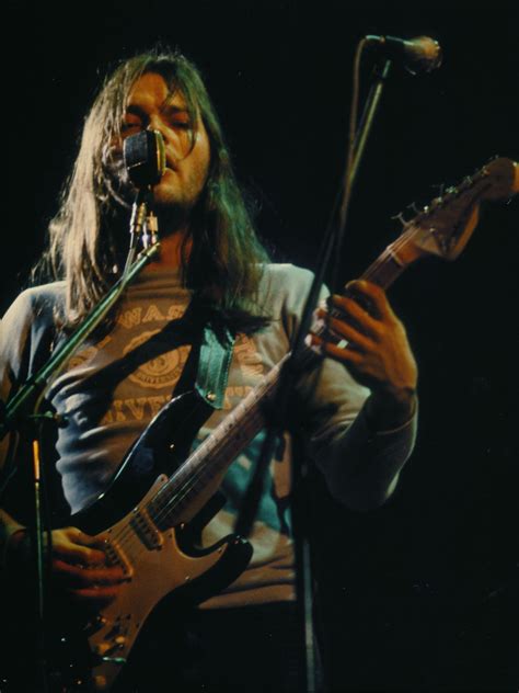 David Gilmour Playing Guitar On Stage During A Concert In France 1974