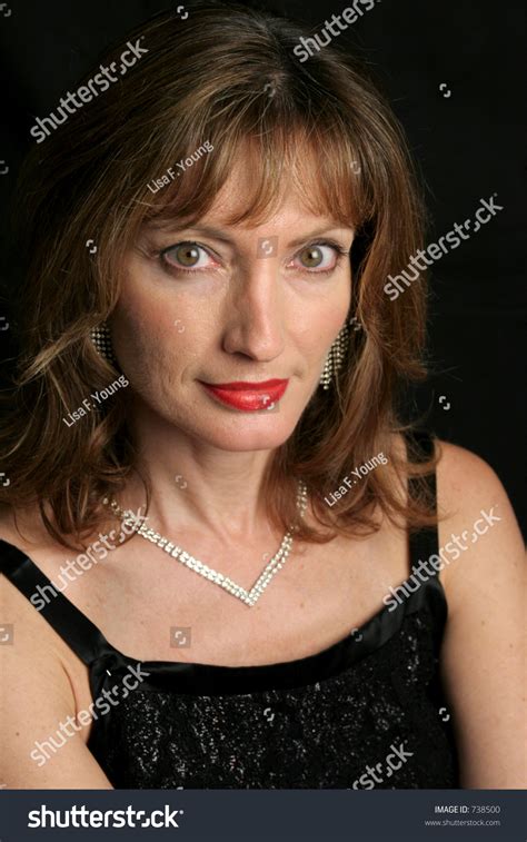 A Portrait Of A Beautiful Sophisticated Woman In An Evening Gown And