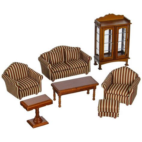 A Living Room Set With Striped Furniture And Coffee Table