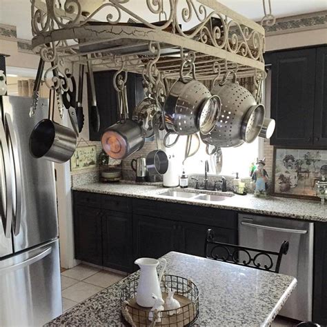 The standard placement of a pot rack is hanging from the ceiling. Best Placing Low Ceiling Pot Rack for Your Kitchen Ideas ...