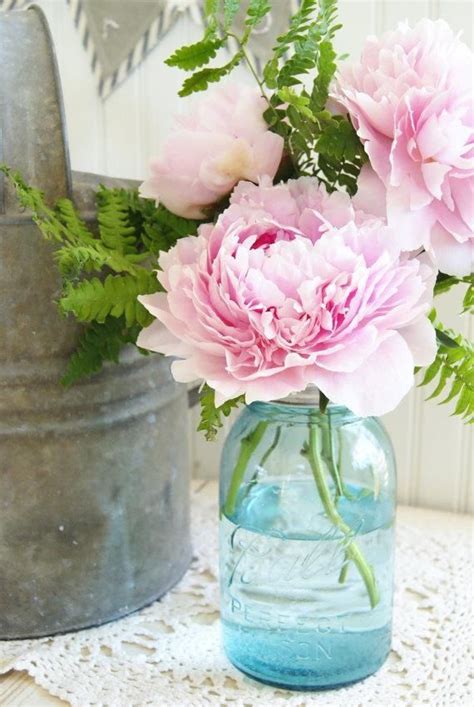 After the wedding, reuse on lids on mason jar vases as home decor with a perfectly proportioned flower arrangement every time! Pink peony in a vintage blue mason jar | Shabby Chic Loves ...