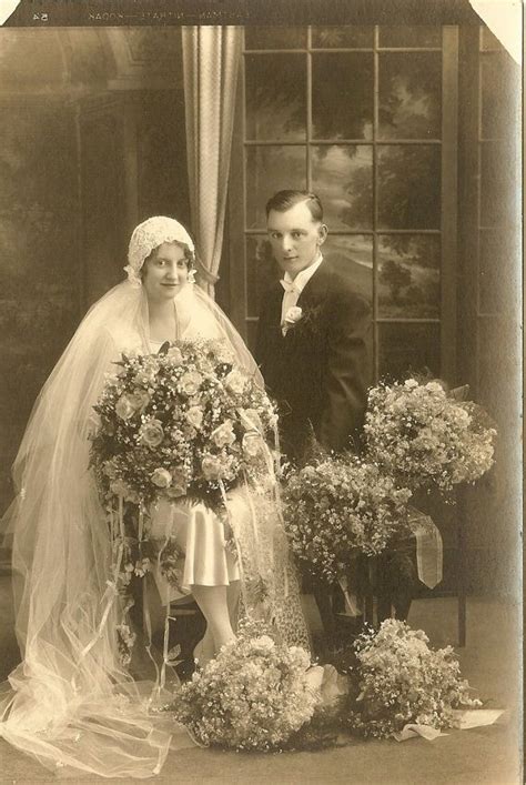 Vintage Bride And Groom Surrounded By Flower Bouquets Vintage Wedding Photos 1920s Wedding