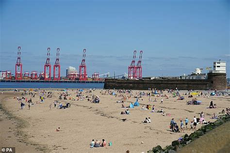 Families Pack Out Beaches As Britain Basks In The Hottest Day Of The Year So Far Daily Mail Online