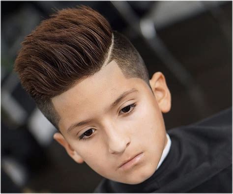 An undercut is a trendy alternative to a fade, and is a great summer hairstyle for boys. Boy Hairstyle For New - Wavy Haircut
