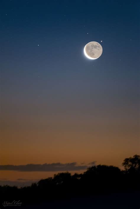 Earthshine Lights The Way To A Saturn Moon In Stunning Night Sky