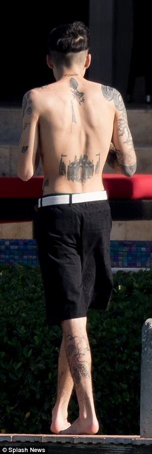 shirtless zayn malik shows off his heavily inked torso daily mail online