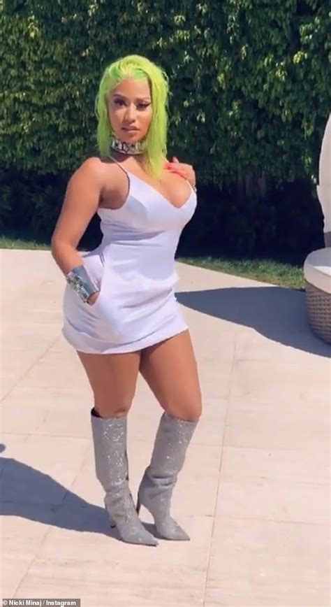 Nicki Minaj Flaunts Her Voluptuous In A Plunging White Mini Dress And