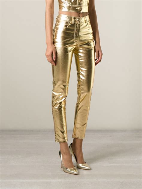 Moschino Skinny High Waisted Stretch Denim Jeans In Gold