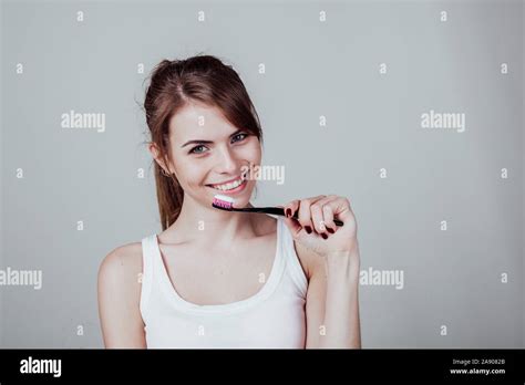 Beautiful Girl Cleans White Teeth Toothbrush Smile Stock Photo Alamy