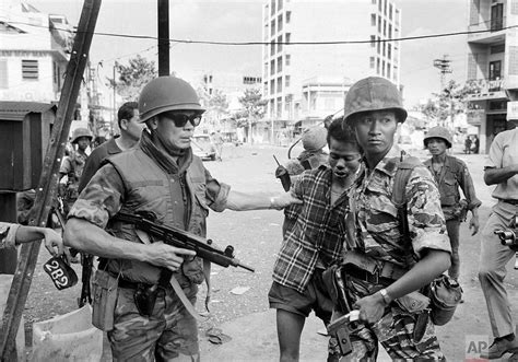 South Vietnamese Field Police Left With The Uzi And Marine Right