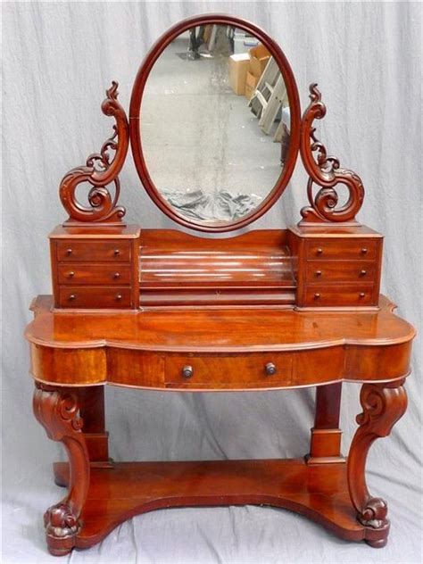 A dressing table should match the proportions of the room and its furniture. A mid Victorian mahogany dressing table 163 cm high. 115 ...